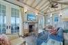 THIRD FLOOR LIVING AREA WITH FLATSCREEN TV AND FIREPLACE THIRD FLOOR LIVING AREA WITH FLATSCREEN TV AND FIREPLACE