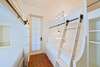 FIRST FLOOR - BUNK ROOM 2 - 1 FULL & 3 TWINS; FRONT PORCH ACCESS