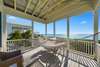 OPEN BALCONY W/ GULF VIEWS, HAMMOCK, AND LOUNGE AREA