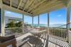 OPEN BALCONY W/ GULF VIEWS, HAMMOCK, AND LOUNGE AREA OPEN BALCONY W/ GULF VIEWS, HAMMOCK, AND LOUNGE AREA
