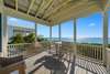 PRIVATE BALCONY OFF LIVING WITH SEATING AND VIEWS