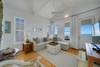 LARGE SECTIONAL IN LIVING NEXT TO BALCONY ACCESS LARGE SECTIONAL IN LIVING NEXT TO BALCONY ACCESS