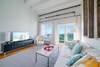LIVING WITH FLATSCREEN TV AND SEATING FOR ALL LIVING WITH FLATSCREEN TV AND SEATING FOR ALL