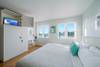 MASTER WITH FLATSCREEN TV AND SWEEPING TOWN AND GULF VIEWS MASTER WITH FLATSCREEN TV AND SWEEPING TOWN AND GULF VIEWS