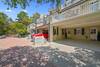 REAR VIEW OF TOWN HOME/ PRIVATE COVERED PARKING FOR 2 REAR VIEW OF TOWN HOME/ PRIVATE COVERED PARKING FOR 2
