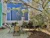 BACKYARD WITH OUTDOOR DINING, GREENERY AND GRILL BACKYARD WITH OUTDOOR DINING, GREENERY AND GRILL