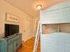 BUNK ROOM WITH TWO SINGLE BEDS AND SINGLE TRUNDLE BUNK ROOM WITH TWO SINGLE BEDS AND SINGLE TRUNDLE