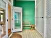 PRIVATE SIDE PORCH WITH BENCH OFF DINING AREA