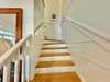 STAIRCASE LEADING TO SECOND STORY