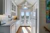 FULLY EQUIPPED KITCHEN WITH GLASS DOORS OPENING TO BALCONY FULLY EQUIPPED KITCHEN WITH GLASS DOORS OPENING TO BALCONY