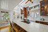 UPDATED KITCHEN NEXT TO SCREENED PORCH ACCESS UPDATED KITCHEN NEXT TO SCREENED PORCH ACCESS