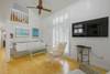 LIVING ALTERNATE VIEW WITH FLATSCREEN TV AND HIGH CEILINGS LIVING ALTERNATE VIEW WITH FLATSCREEN TV AND HIGH CEILINGS