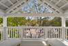 OPEN PORCH W/TWO CHAISE LOUNGERS & TUPELO CIRCLE VIEWS