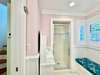 FULL BATH TO RIGHT OF ENTRY ON FIRST LEVEL SHOWER ONLY