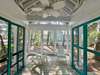 SCREENED, FURNISHED FRONT PORCH WITH OUTDOOR FAN