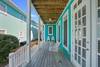 LARGE OPEN FRONT PORCH W/SWING & ADIRONDACK SEATING LARGE OPEN FRONT PORCH W/SWING & ADIRONDACK SEATING