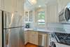 UPDATED FULL KITCHEN OFF LIVING AREAS, 4 BURNER STOVE