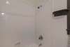TUB & SHOWER COMBINATION IN FULL BATH IN QUEEN