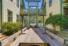 LIGHTED OUTDOOR DINING AREA SEATS 14, PLUS 2 CHARCOAL GRILLS LIGHTED OUTDOOR DINING AREA SEATS 14, PLUS 2 CHARCOAL GRILLS