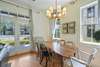ADJACENT DINING AREA OFF KITCHEN SEATS 8