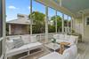 LARGE PORCH WITH CUSHIONED, OUTDOOR SEATING FOR ALL LARGE PORCH WITH CUSHIONED, OUTDOOR SEATING FOR ALL