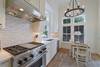 RENOVATED KITCHEN OFF OF LIVING & DINING RENOVATED KITCHEN OFF OF LIVING & DINING