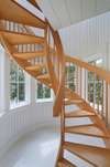 STUNNING SPIRAL STAIRCASE IN FOYER ENTRANCE LEADING TO SECOND FL