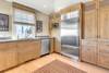 KITCHEN WITH ALL STAINLESS STEEL APPLIANCES; SUB ZERO FRIDGE KITCHEN WITH ALL STAINLESS STEEL APPLIANCES; SUB ZERO FRIDGE