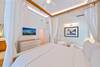 55" FRAME TV, CARIBBEAN ARTWORK, SWIVEL CHAIRS IN BEDROOM 55" FRAME TV, CARIBBEAN ARTWORK, SWIVEL CHAIRS IN BEDROOM
