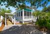PRIVATE DRIVEWAY FOR ONE, BOARDWALK LEADS TO KEY WEST IN REAR PRIVATE DRIVEWAY FOR ONE, BOARDWALK LEADS TO KEY WEST IN REAR