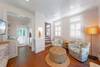 LIVING AREA OFF ENTRANCE W/TWO SWIVEL CHAIRS LIVING AREA OFF ENTRANCE W/TWO SWIVEL CHAIRS
