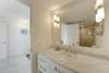 RENOVATED ENSUITE FULL BATH W/SINGLE VANITY & GLASS ENCLOSED SHO