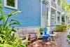OUTDOOR GRILLING AND ADIRONDACK SEATING IN LUSH YARD OUTDOOR GRILLING AND ADIRONDACK SEATING IN LUSH YARD