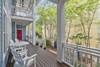 EXPANSIVE DOWN PORCH RUNS LENGTH OF HOME EXPANSIVE DOWN PORCH RUNS LENGTH OF HOME