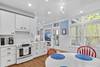 KITCHEN W/FOUR BURNER ELECTRICAL STOVE TOP, AMPLE COOKWARE KITCHEN W/FOUR BURNER ELECTRICAL STOVE TOP, AMPLE COOKWARE