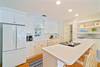 BEAUTIFUL KITCHEN WITH ISLAND WITH BAR SEATING FOR 4 BEAUTIFUL KITCHEN WITH ISLAND WITH BAR SEATING FOR 4