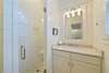 FULL BATH W/SINGLE VANITY & GLASS ENCLOSED SHOWER OFF OF BONUS R