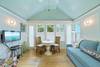LARGE MOUNTED FLAT SCREEN, DINING, & ACCESS TO BALCONY LARGE MOUNTED FLAT SCREEN, DINING, & ACCESS TO BALCONY