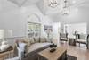 THE LIVING AREA IS FULL OF COTTAGE CHARM WITH TONGUE AND GROOVE THE LIVING AREA IS FULL OF COTTAGE CHARM WITH TONGUE AND GROOVE