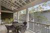 SECOND FLOOR BALCONY WITH DINING TABLE AND ROCKING CHAIRS SECOND FLOOR BALCONY WITH DINING TABLE AND ROCKING CHAIRS