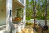 OUTDOOR SHOWER AND CHARCOAL GRILL OUT FRONT OUTDOOR SHOWER AND CHARCOAL GRILL OUT FRONT
