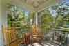 TWO ROCKING CHAIRS ON SECOND FLOOR PORCH TWO ROCKING CHAIRS ON SECOND FLOOR PORCH