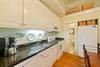 KITCHEN W/ HALF BATH ON THE RIGHT KITCHEN W/ HALF BATH ON THE RIGHT