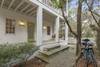 SUITE II STEPS TO FRONT ENTRANCE, BENCH SWING AT FRONT SUITE II STEPS TO FRONT ENTRANCE, BENCH SWING AT FRONT
