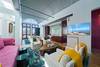 ALTERNATE VIEW OF THIRD FLOOR LIVING AREA WITH HIGH CEILINGS ALTERNATE VIEW OF THIRD FLOOR LIVING AREA WITH HIGH CEILINGS
