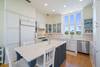 RENOVATED KITCHEN W/CENTER ISLAND W/SEATING FOR 3 MORE RENOVATED KITCHEN W/CENTER ISLAND W/SEATING FOR 3 MORE