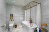 BUNK ROOM ENSUITE BATHROOM WITH SHOWER AND TUB BUNK ROOM ENSUITE BATHROOM WITH SHOWER AND TUB