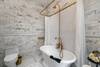 PRIMARY KING BEDROOM ENSUITE BATHROOM WITH SHOWER AND TUB PRIMARY KING BEDROOM ENSUITE BATHROOM WITH SHOWER AND TUB