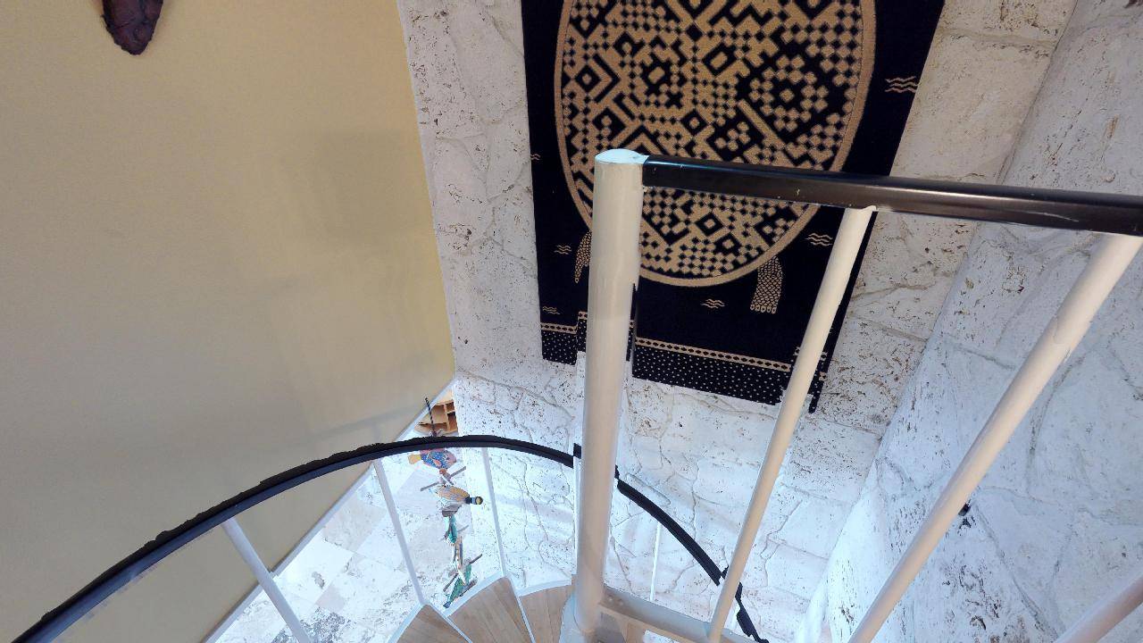 Spiral staircase to upstairs bedroom - 2nd view