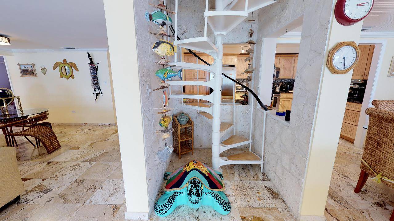 Spiral staircase to upstairs bedroom